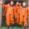Astronauts depart quarters for launch pad