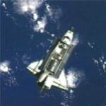 ISS cameras watch Discovery's approach