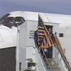 Astronauts exit Discovery on runway