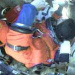 Commander Eileen Collins boards Discovery