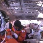Mission specialist Soichi Noguchi boards Discovery