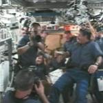 Shuttle crew welcomed aboard the station