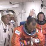 Mission specialist Andy Thomas boards Discovery
