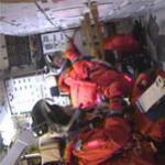 Mission specialist Wendy Lawrence boards Discovery