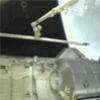 OBSS placed back in shuttle bay