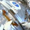 Spacewalkers traverse around station exterior