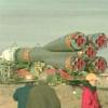 Soyuz rocket rolls to the launch pad
