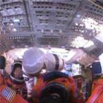 Mission specialist Steve Robinson boards Discovery